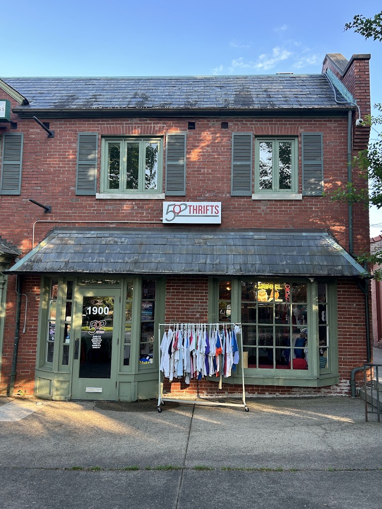502 Thrifts daytime exterior, full brick building with sage green trim