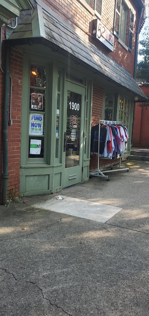 502 Thrifts side street view, clothes rack out front