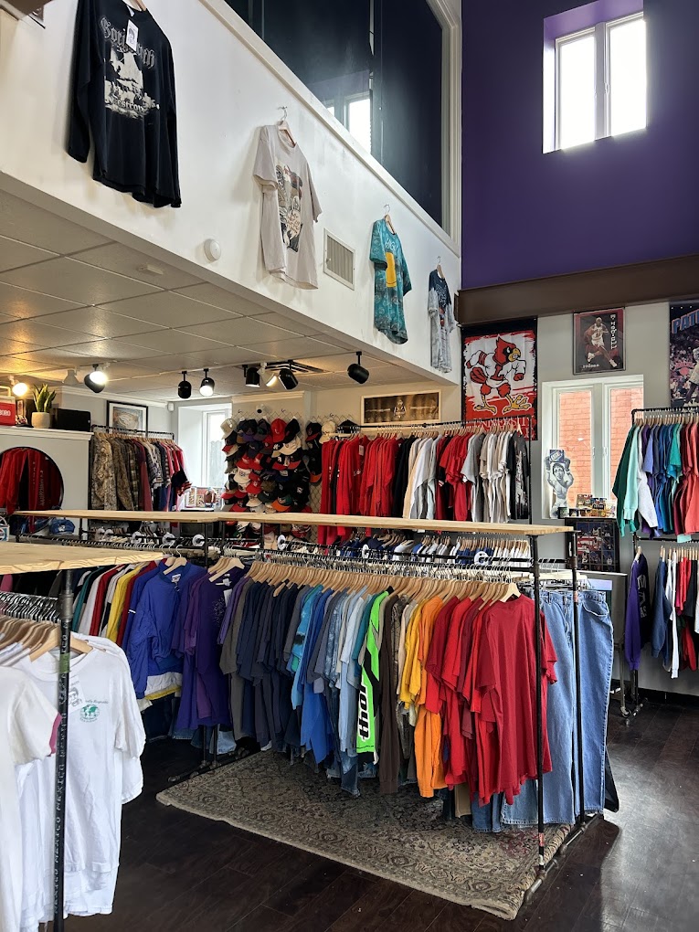 Rainbow clothing racks at 502 Thrifts